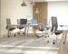 The Benefits Of Incorporating Wood Into Your Workplace - Wooden desks with painted walls and wooden slat features